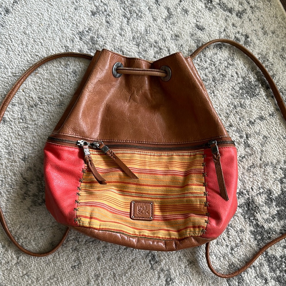 The Sak Drawstring Leather and Fabric Backpack OS